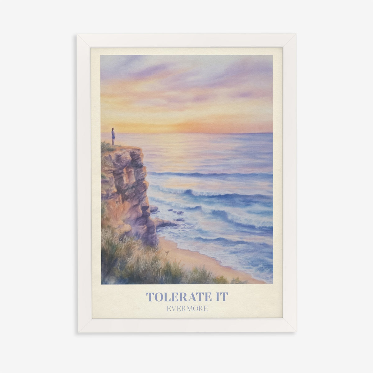 Tolerate It Taylor Swift print of a lone figure on a clifftop above a lilac sunset sea, in a white frame on a plain wall