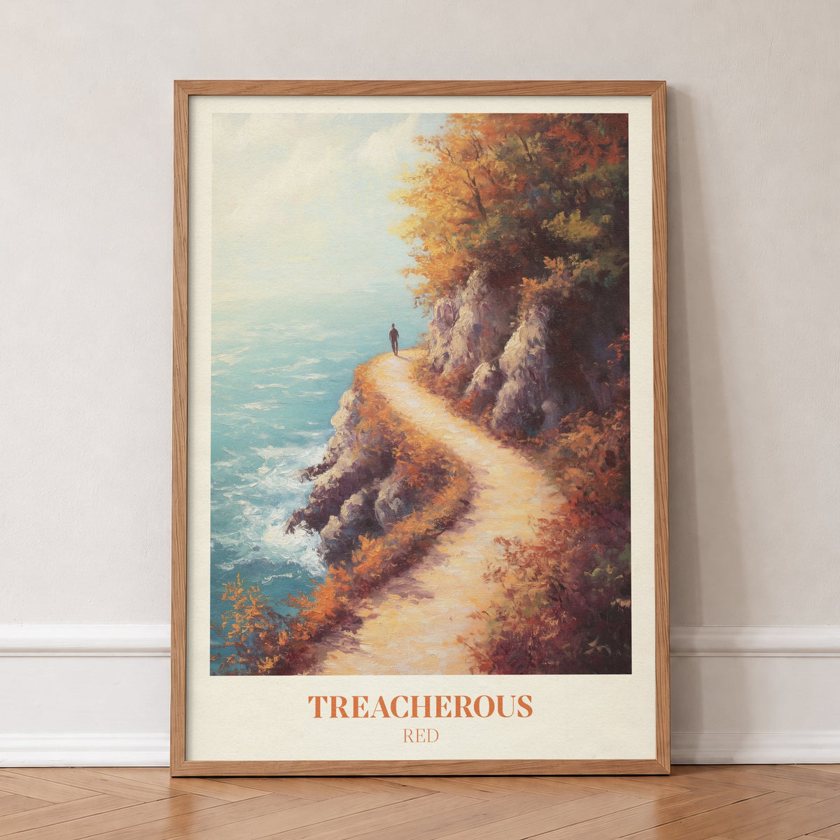 Treacherous Taylor Swift print of a lone walker on a cliff path above the sea in autumn, in an oak frame, leaning against a wall on a herringbone floor