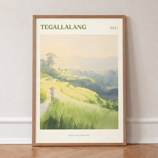 Tegallalang travel print of green rice terraces in Bali with a farmer in a conical hat, in an oak frame, leaning against a wall on a herringbone floor