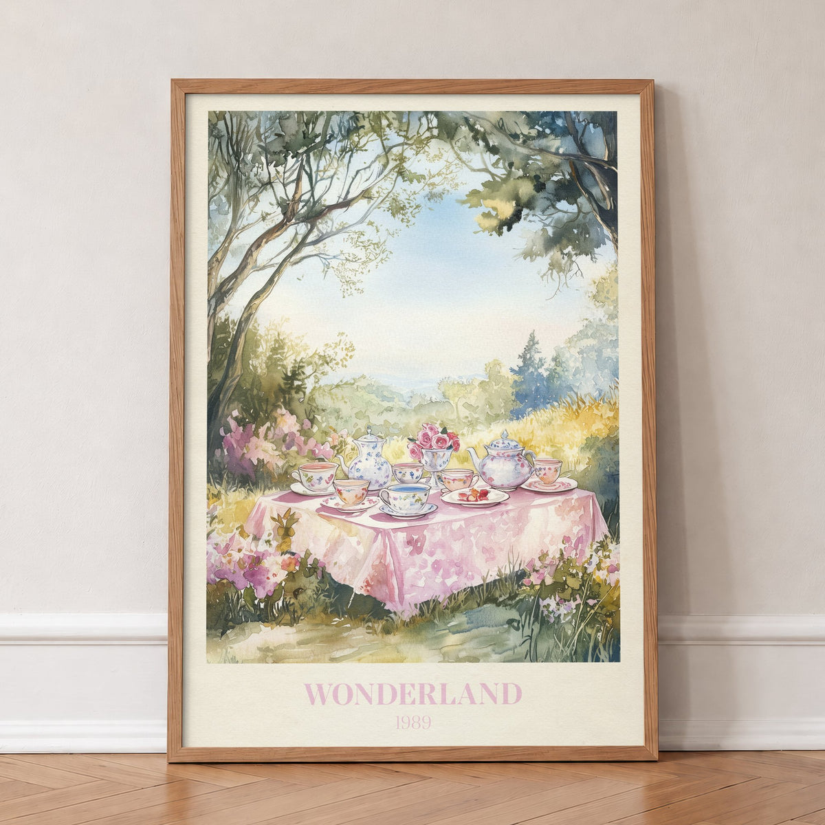 Wonderland Taylor Swift print of a tea party on a pink tablecloth in a sunny woodland clearing, in an oak frame, leaning against a wall on a herringbone floor