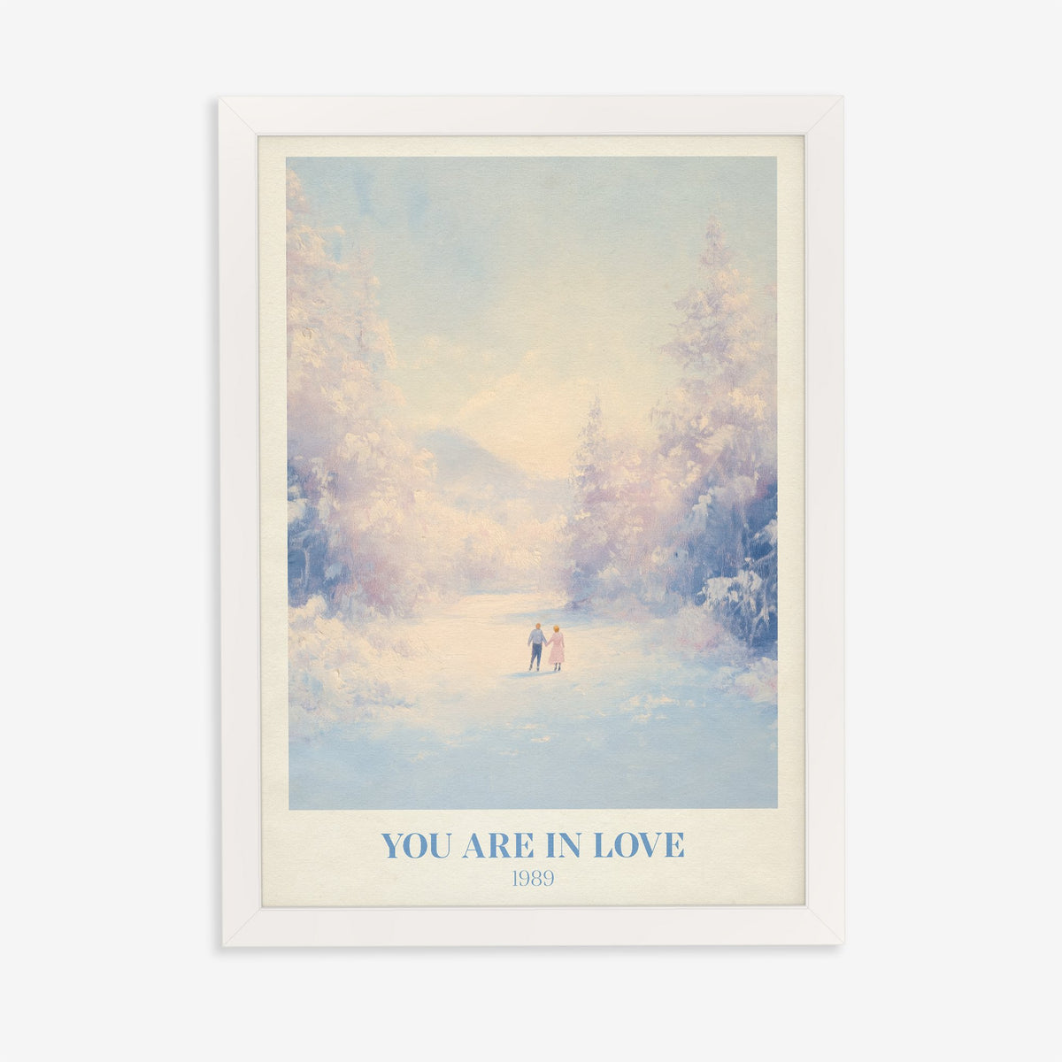 You Are In Love Taylor Swift print of a couple holding hands on a snowy path, in a white frame on a plain wall