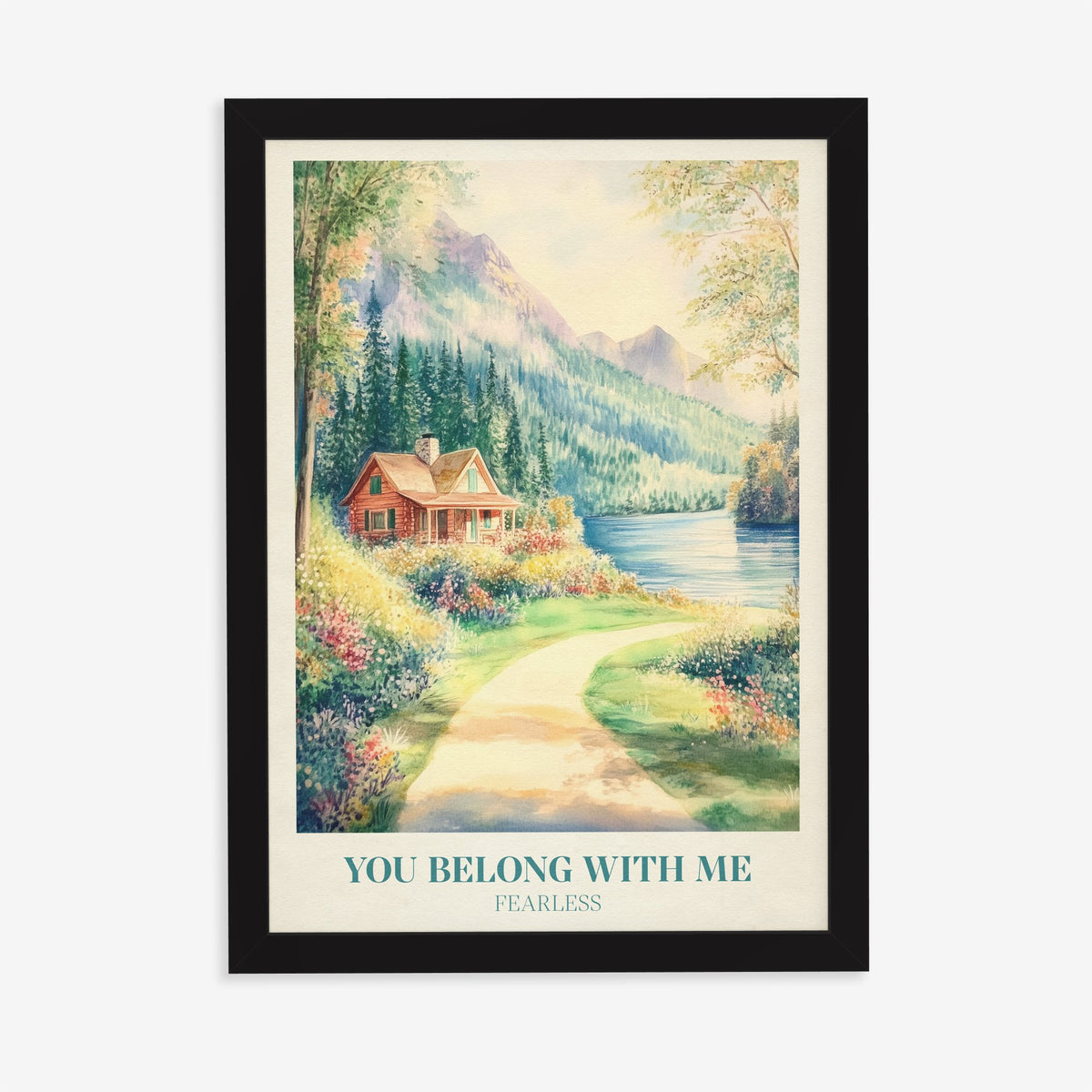 You Belong With Me Taylor Swift print of a red cabin by a mountain lake with a flowery path, in a black frame on a plain wall