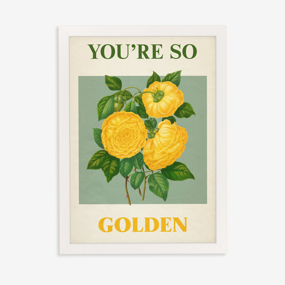 You're So Golden Harry Styles print of yellow roses on sage green, in a white frame on a plain wall