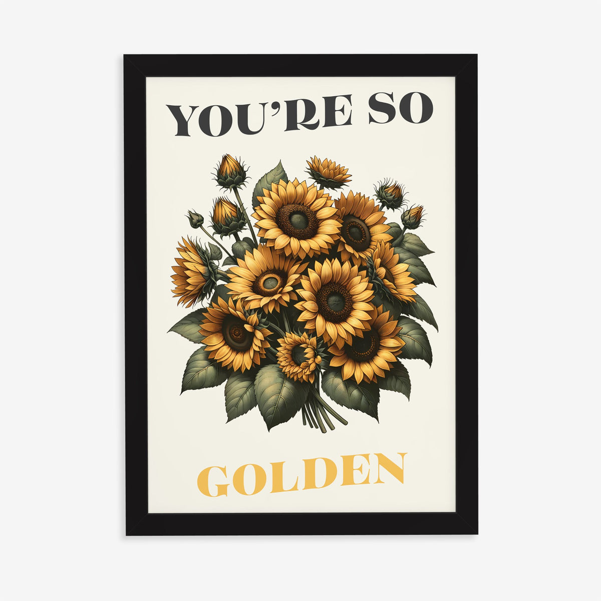 You're So Golden Harry Styles print of a sunflower bouquet on cream, in a black frame on a plain wall